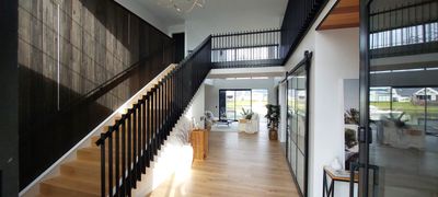 Black balustrade on a timber staircase, Whitianga