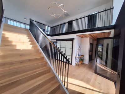 Black balustrade on a timber staircase, Whitianga