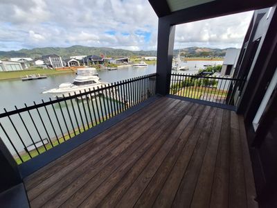 Architectural black aluminium balustrade on a waterfront balcony, Whitianga