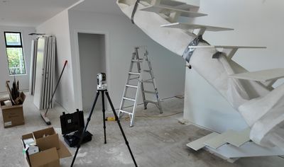 Leica iCON iCS50 measuring system set up on a staircase install site